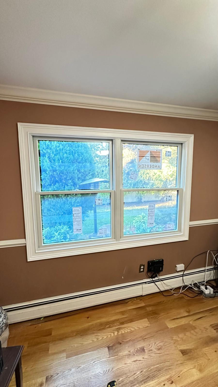 Two windows with blue stained glass design.