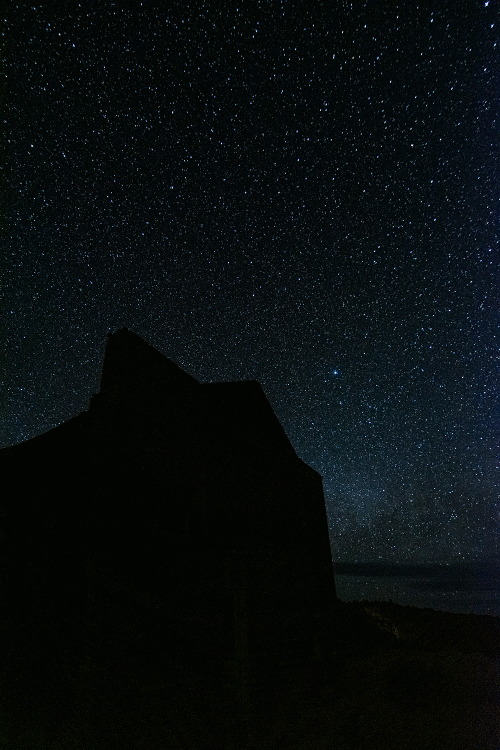 The darkness of a ghost town at night is evident at Tybo, Nevada