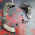 A shattered stock Harley-Davidson M8 compensator