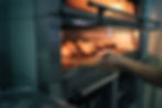 Baker making bread at a bakery. Bakery Concept..jpg