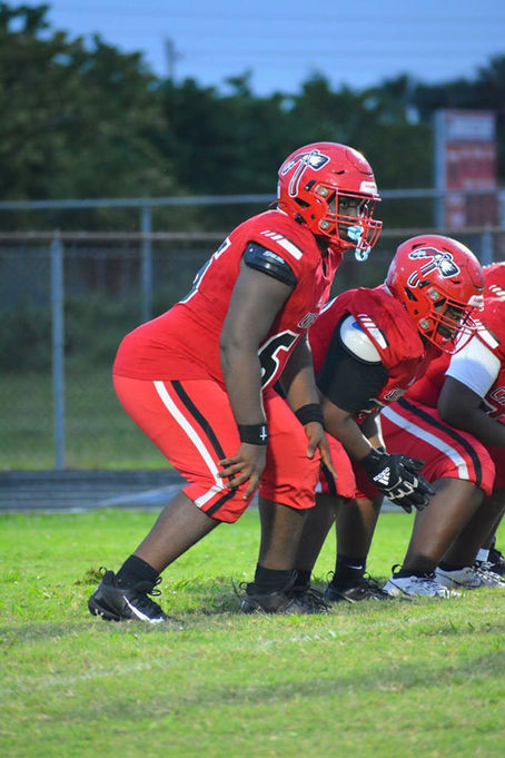 "Quick Feet and Fierce Blocking in the Trenches"