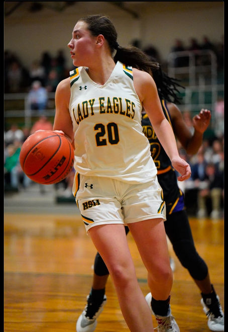 "Dominating the Paint: A Rising Star's Defensive and Scoring Power"