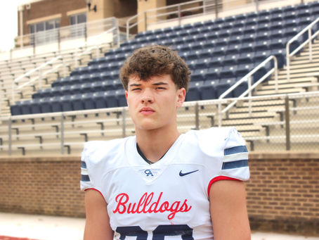 "Strapped and Snapping: The Fierce Force Who Does It All"