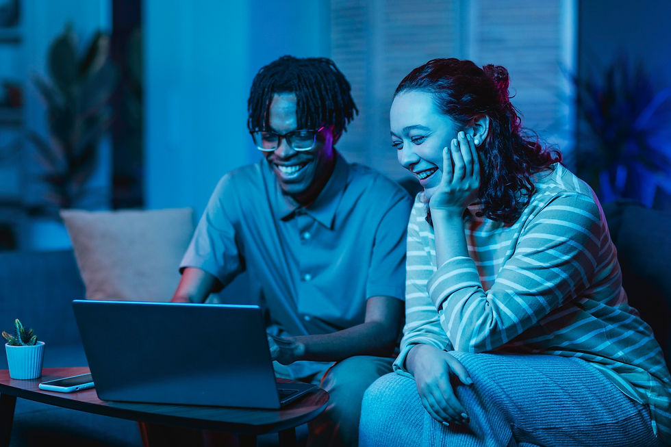 couple-using-laptop-while-couch-home-together.jpg