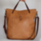 The bag has a long leather cross body strap