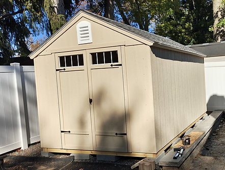This is an image of the completed toolshed with its doors closed.
