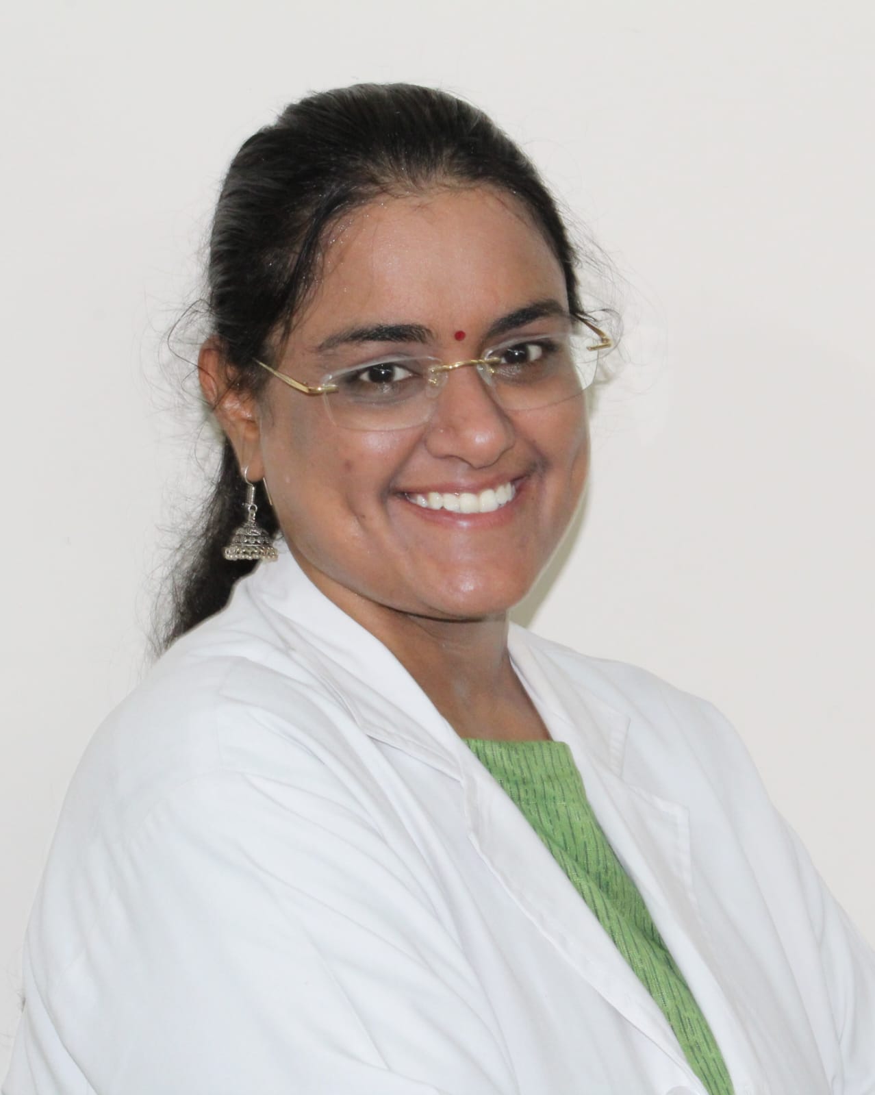 Dr. Archana B