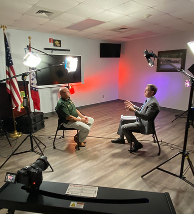 Mark Albert Interviewing Sheriff.jpeg