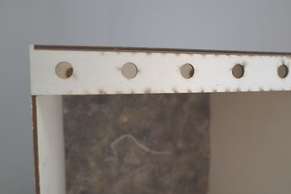 Thumbnail: hanging holes in the top of the spray booth