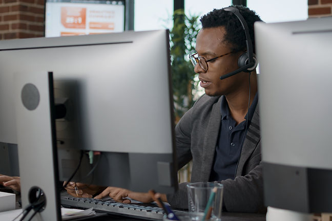 african-american-employee-using-headset-customer-service-job-asnwering-call-about-telemark