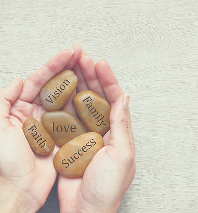 Hands Holding Inspirational Stones_edite
