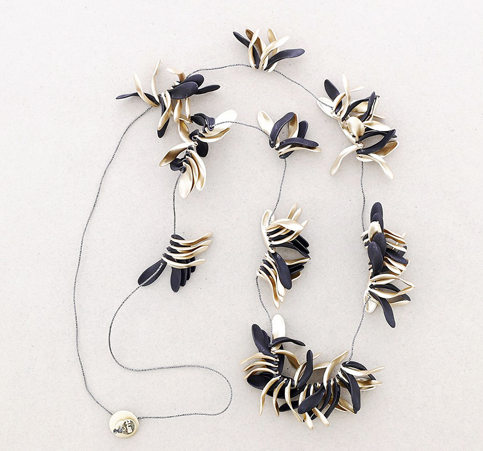 Thumbnail: Stunning black and gold, adjustable, leaf necklace on black thread