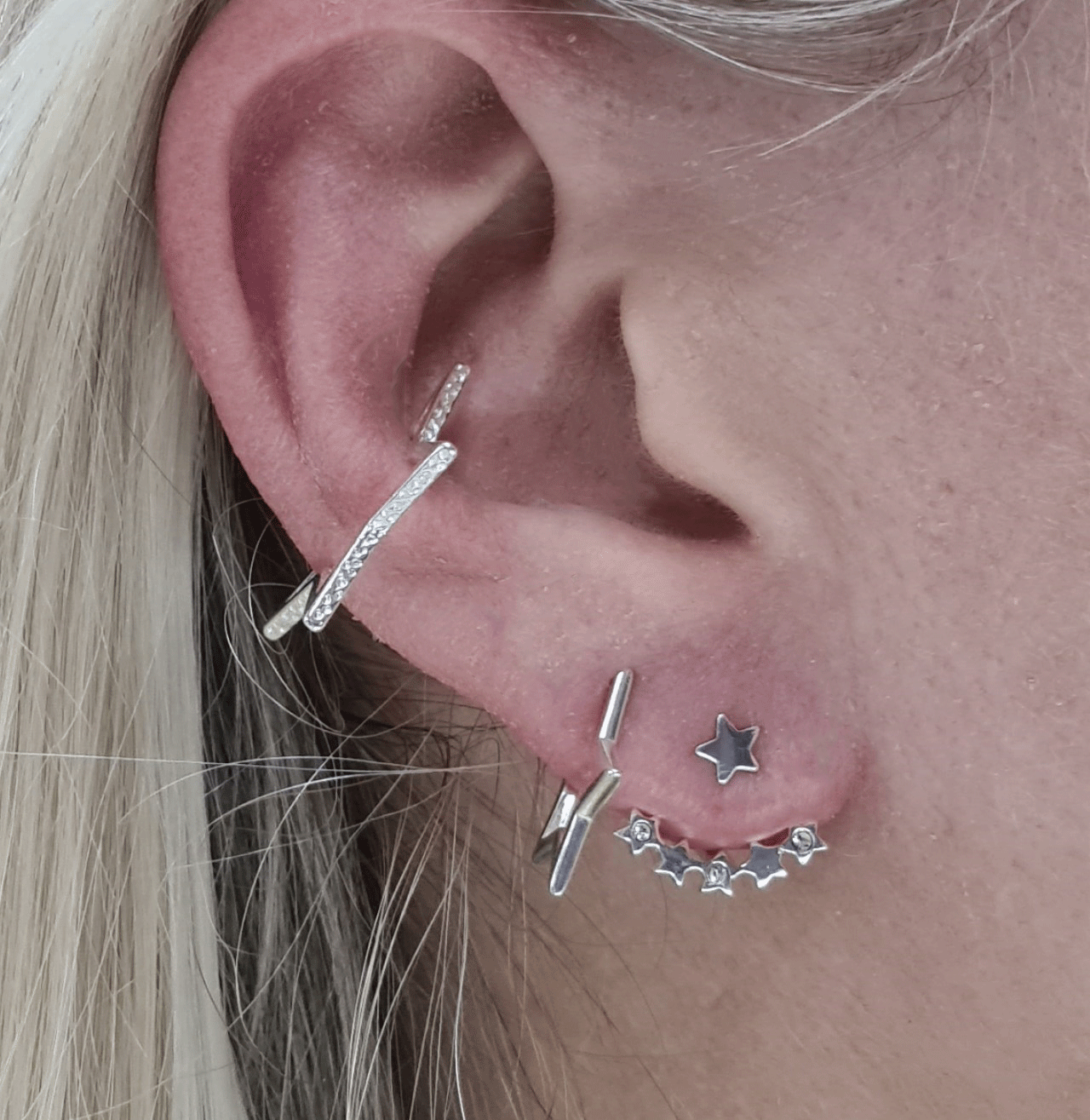 Thumbnail: Funky silver textured open star ear cuff