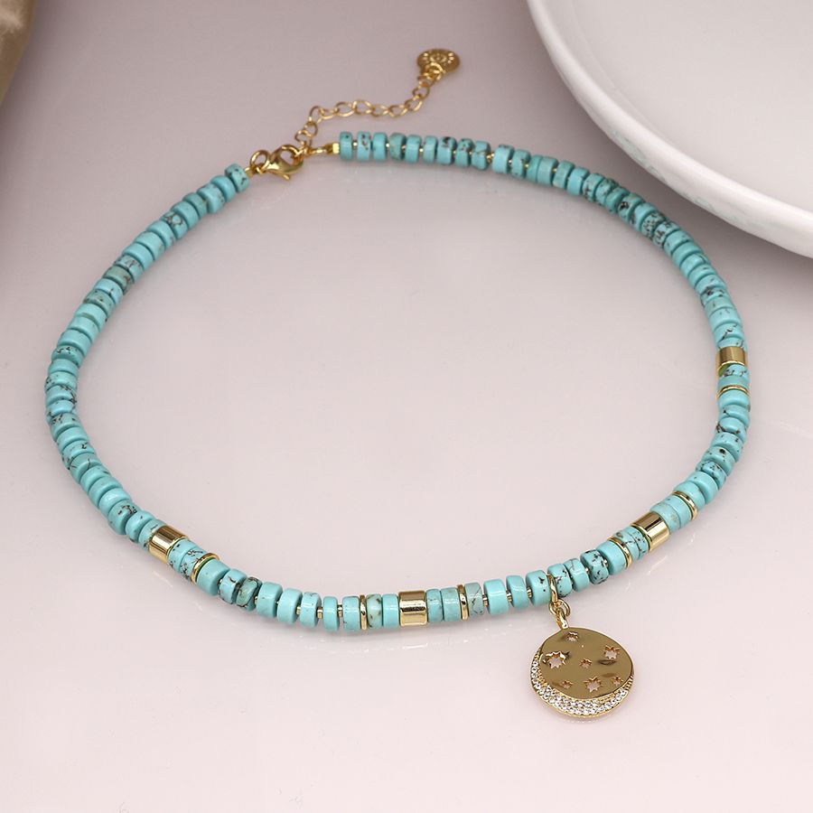 Thumbnail: Turquoise and gold mix necklace  with golden crystal star disc
