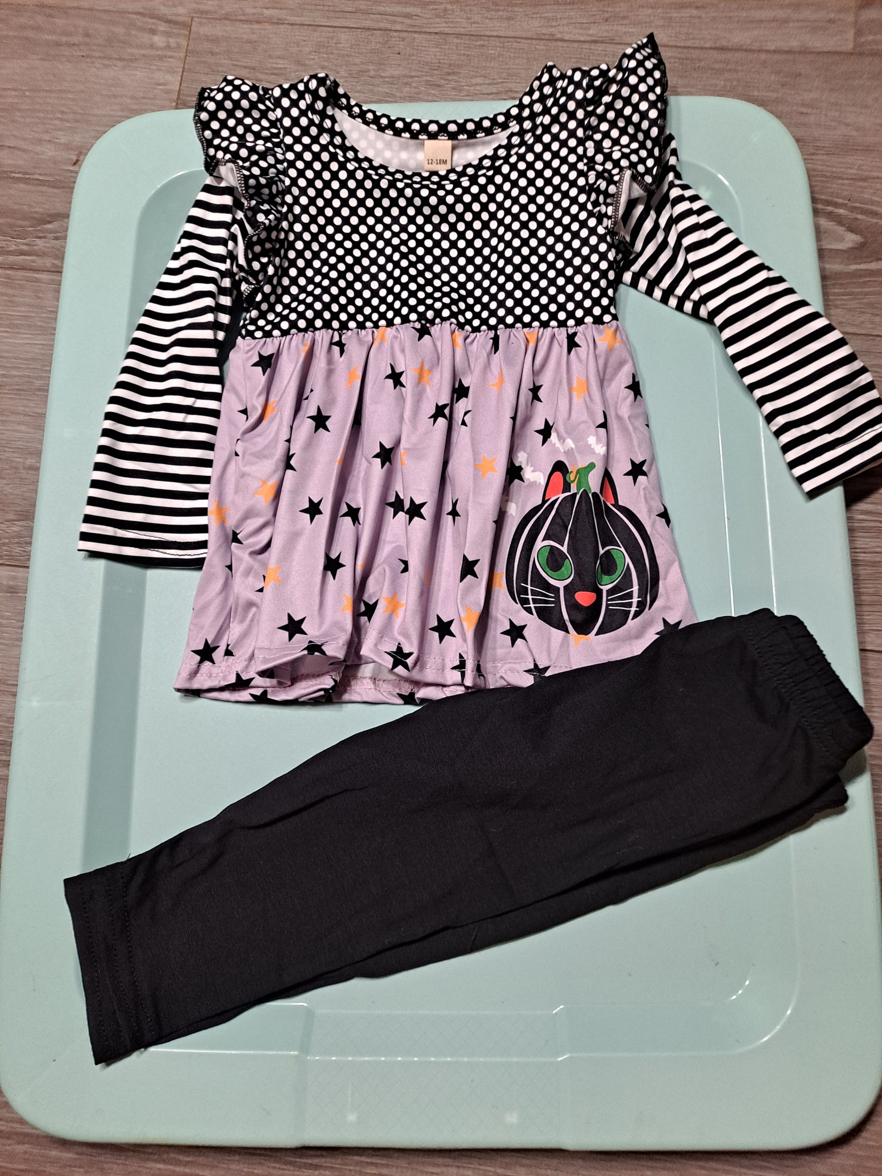 Purple with black cat