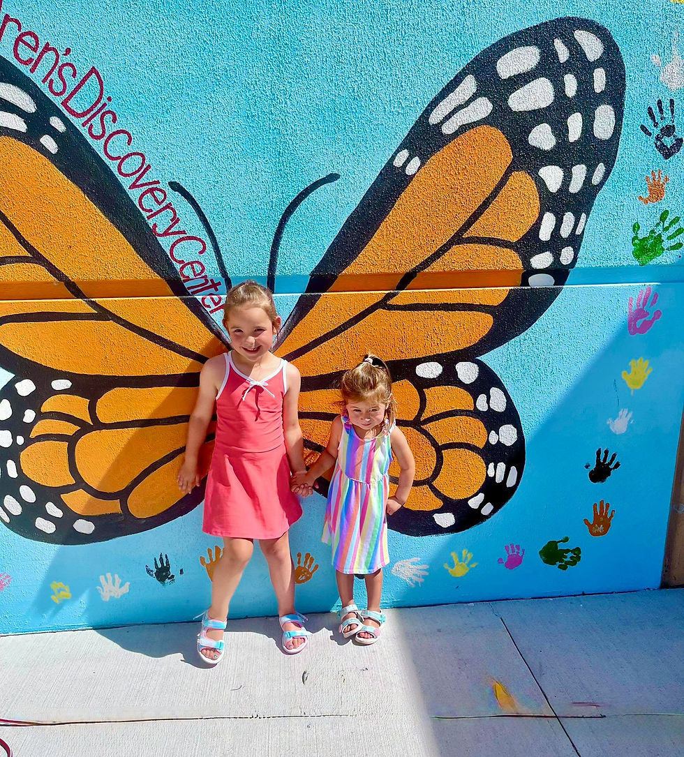 Take a photo at our Monarch Mural!