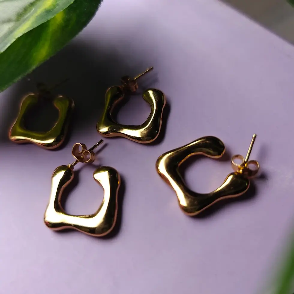 Classic gold hoop earrings with smooth finish