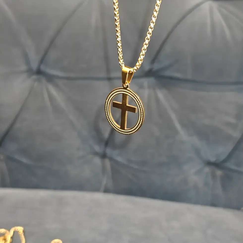 Long gold-tone men's pendant necklace featuring a circular frame with a polished cross centerpiece, designed for a clean and