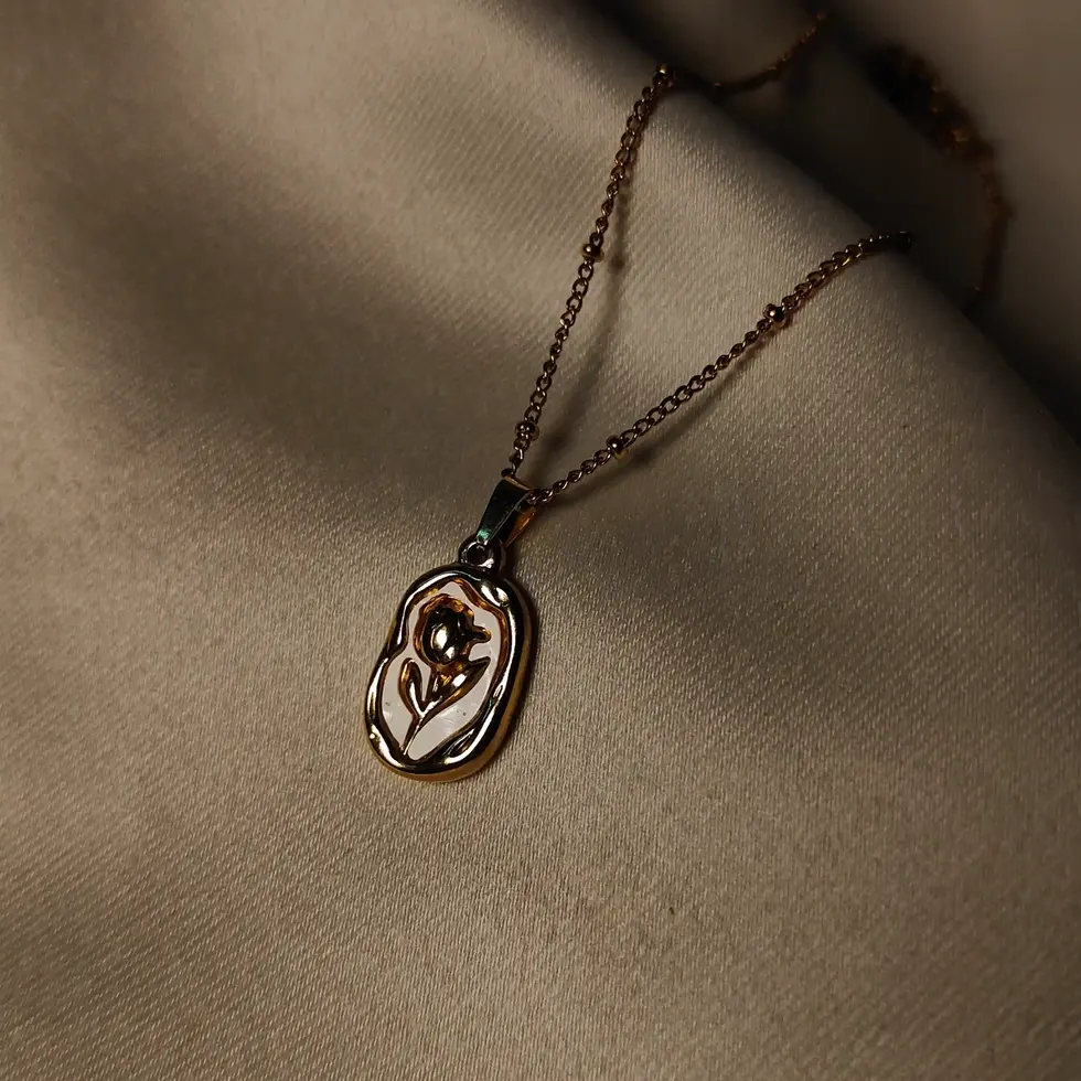 Gold rose pendant necklace with delicate chain