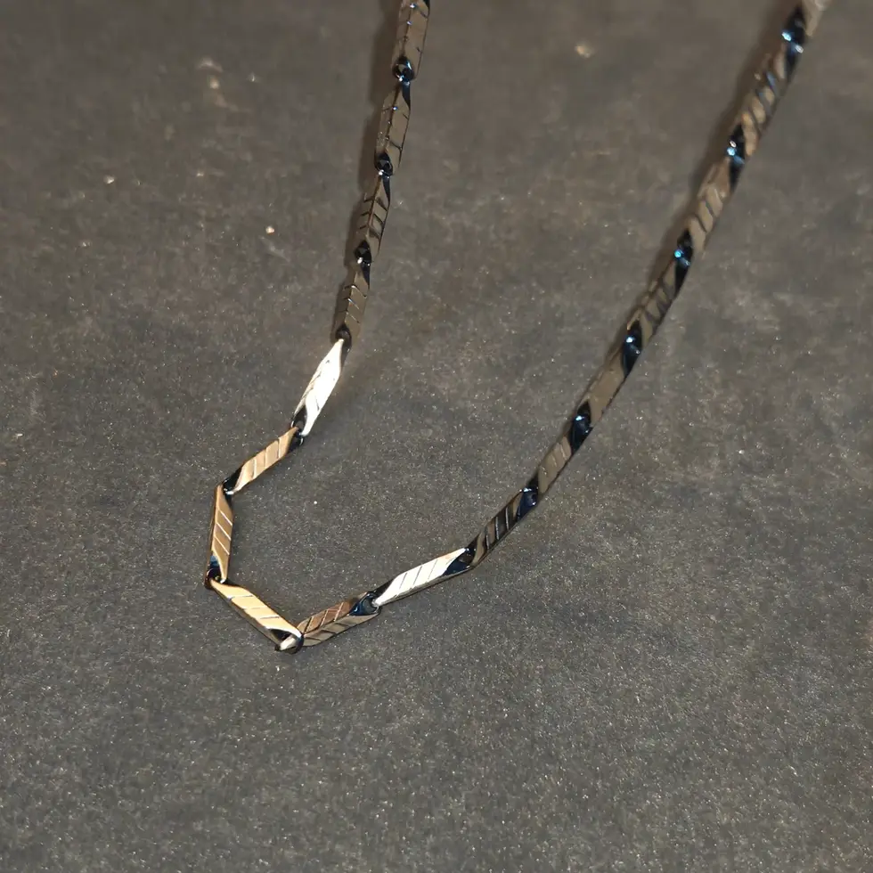 Long silver-tone men's chain featuring engraved angular links with a bold, contemporary design for everyday styling.
