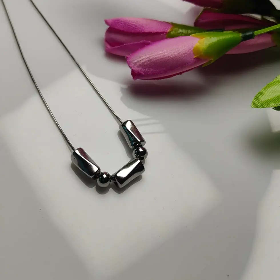 Silver chain with alternating rectangle and ball bead design