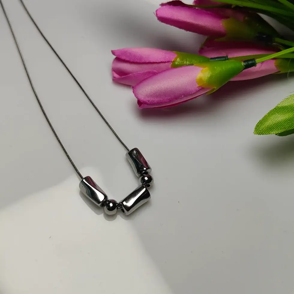 Silver chain with alternating rectangle and ball bead design