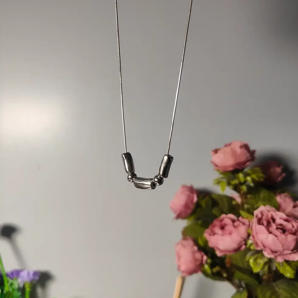 Silver chain with alternating rectangle and ball bead design