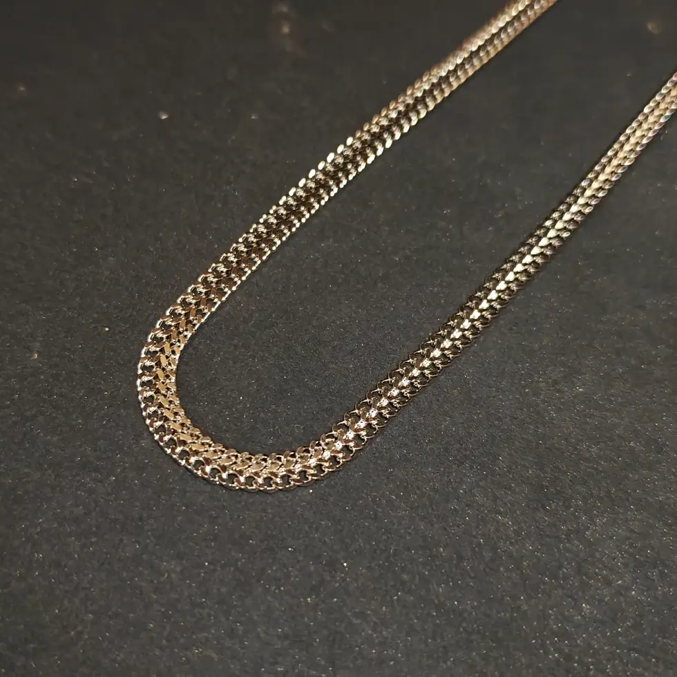 Long silver-tone men's curb chain with a bold flat-link design, perfect for making a clean everyday statement.