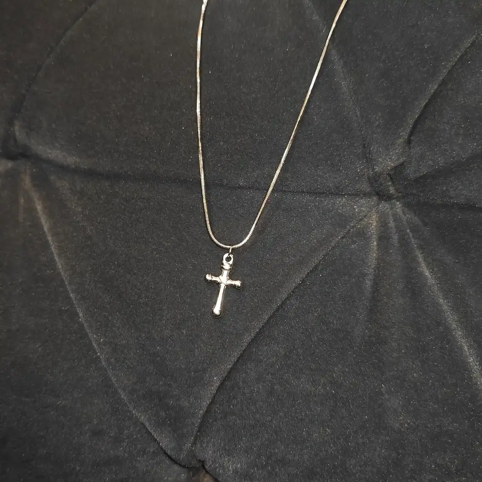 Long silver-tone men's cross pendant necklace with a sleek polished cross, designed for a clean and timeless everyday look.