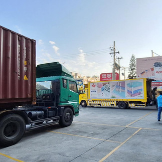 Trucks queuing for shipment in busy morning