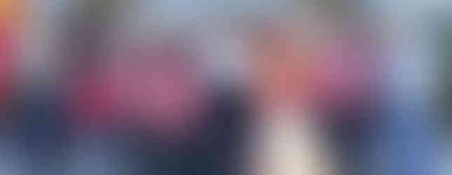 A happy photo of the God of Wealth and volunteers