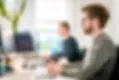 Men Working on PC
