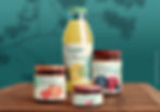 Jam jars and a juice bottle with labels with illustrated fruit silhouettes such as apples, pears, plums, raspberries, peaches and apricots