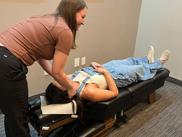xpecting mother receiving prenatal chiropractic care in Mesa, AZ