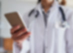 medical-doctor-hand-with-phone-hospital-healthcare-research-update-information-cardiology-