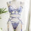 Thumbnail: Elegant purple lingerie set on mannequin, showcasing intricate lace details.