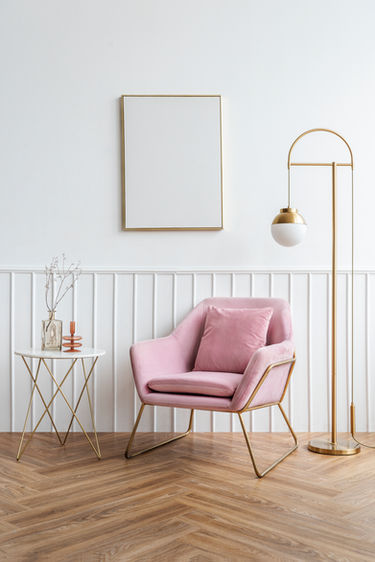 blank-picture-frame-by-pink-velvet-armchair.jpg