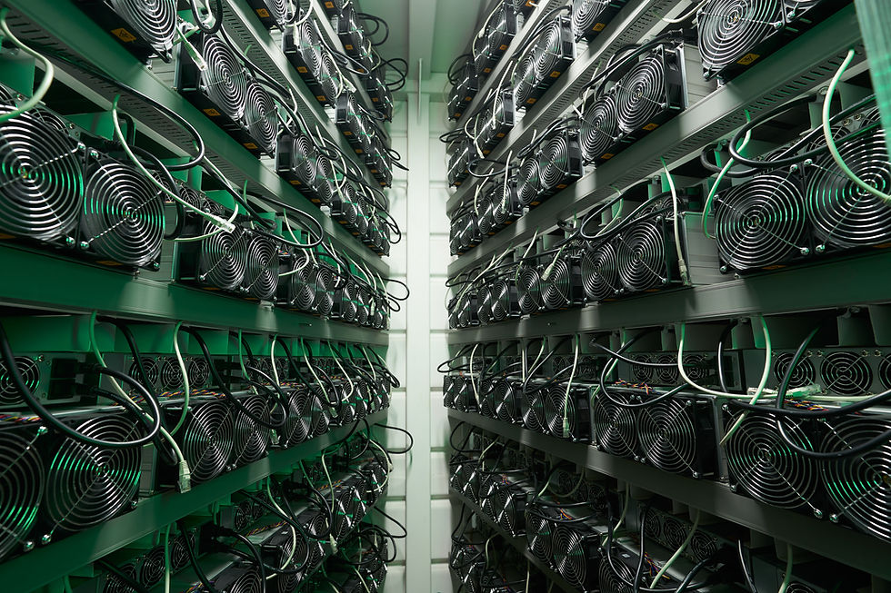 Bitcoin miners in large farm. ASIC mining equipment on stand racks mine cryptocurrency in
