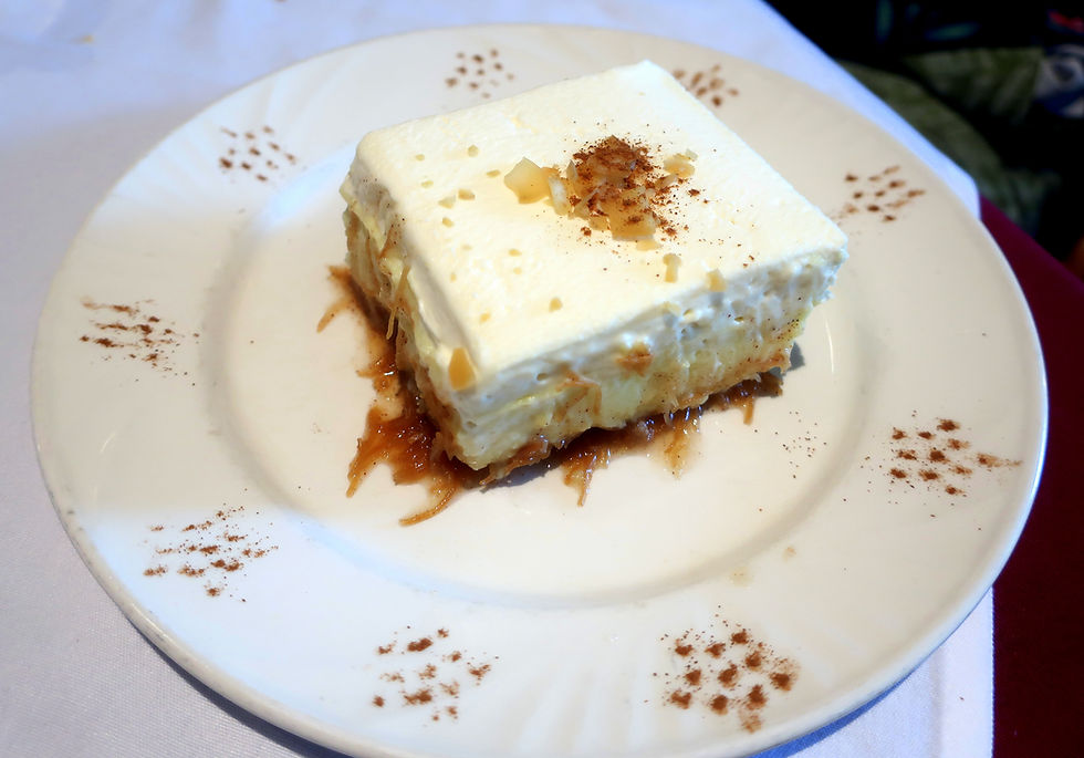 Layers of cream, custard, on cinnamon-glazed kadaifi.