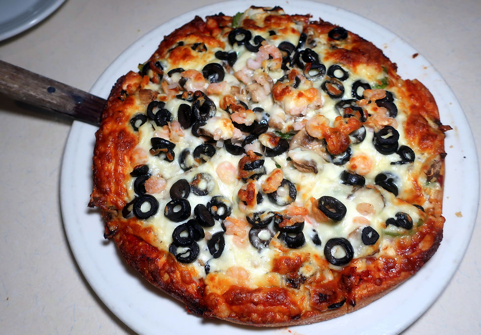 Ham, mushrooms, pepperoni, shrimp, salami, green peppers, onions & olives.