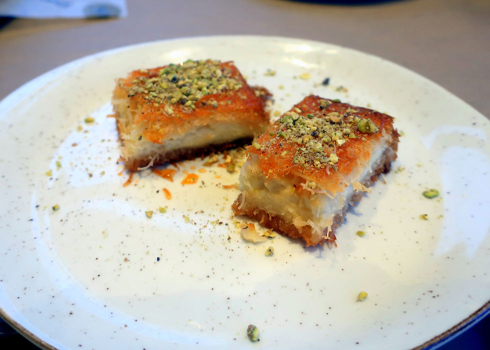 Handmade rich, creamy cheese dessert with a salty-sweet flavour and crunchy phyllo dough topping, Drizzled with sweet rose blossom syrup.