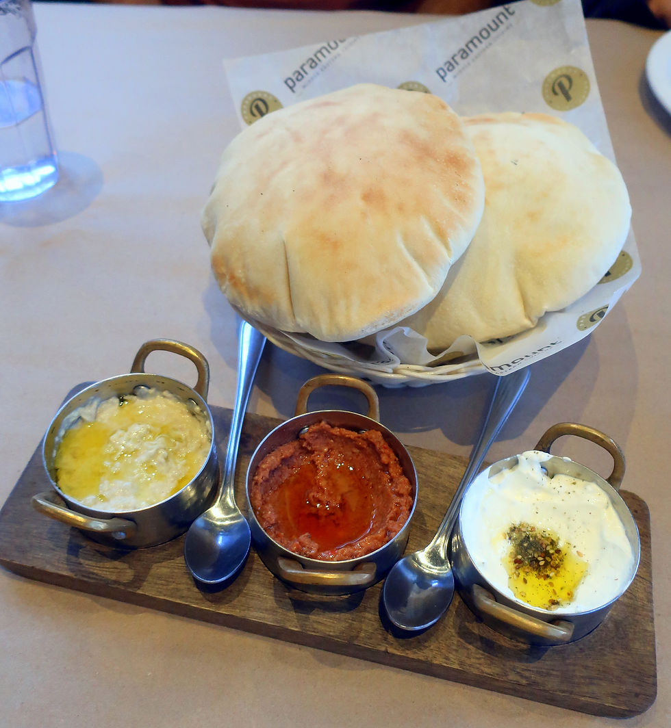 Choice of three: world-famous hummus, moutabbal, labneh, muhammara, or tabbouleh.