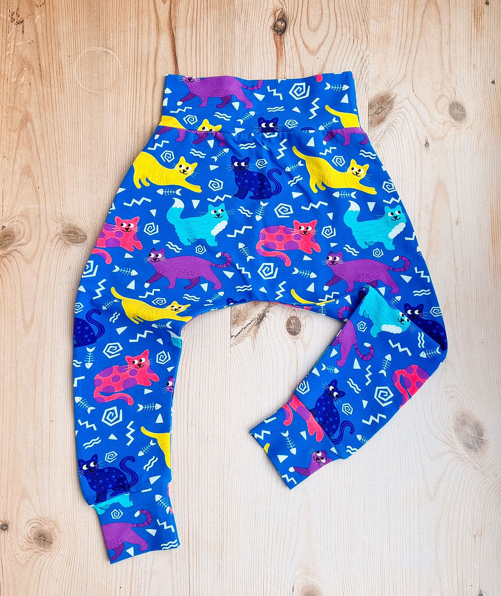 Blue baby harem pants with a memphis inspired cat design - Simpson +C handmade children's clothing