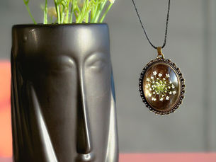 The Blossoming History of Botanical Resin Jewellery