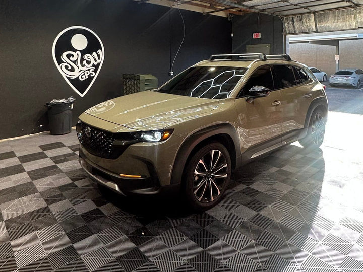 Green Mazda CX-50 at SlowGPS