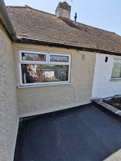 flat roof and render refurb.