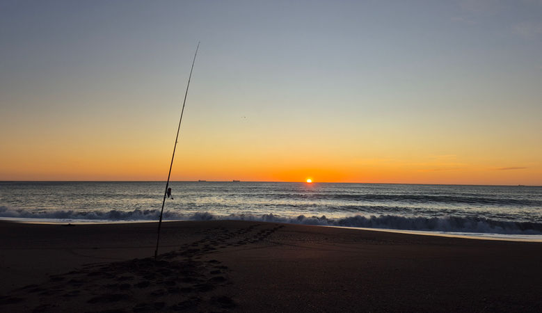 Team member outdoors fishing.