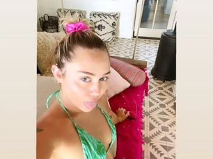 Miley Cyrus is all about ‘hot girl summer’ in sexy green skimpy bikini