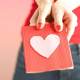 handmade card being given to someone
