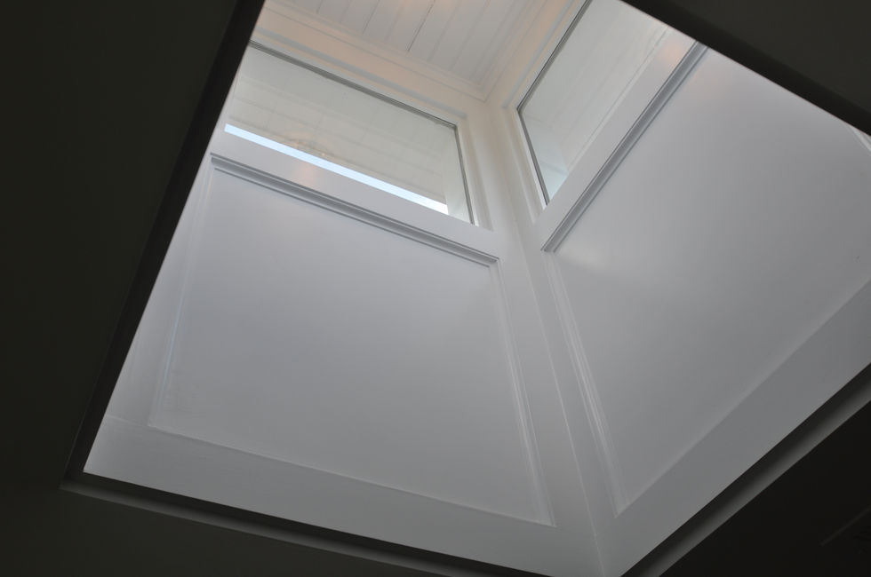 cupola is a decorative, often small, tower-like structure that protrudes from a building's roof